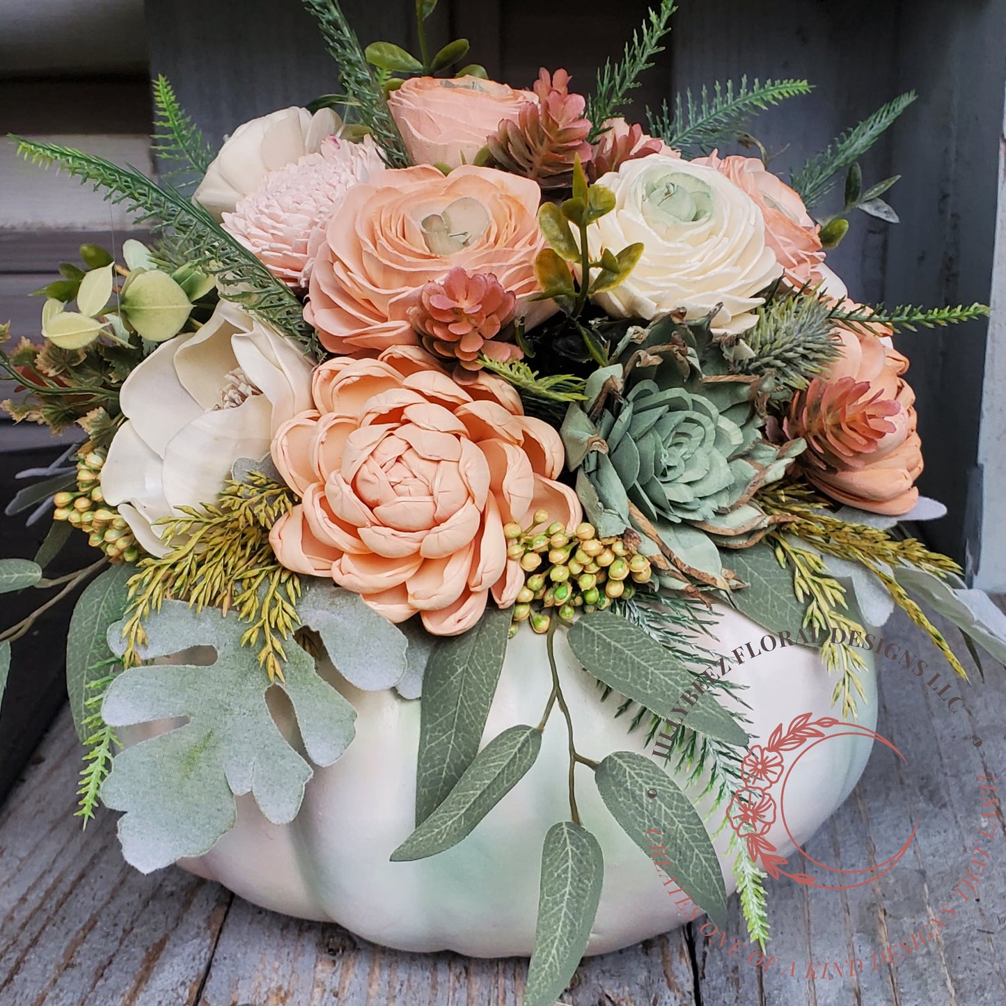 Wood flower faux pumpkin arrangement